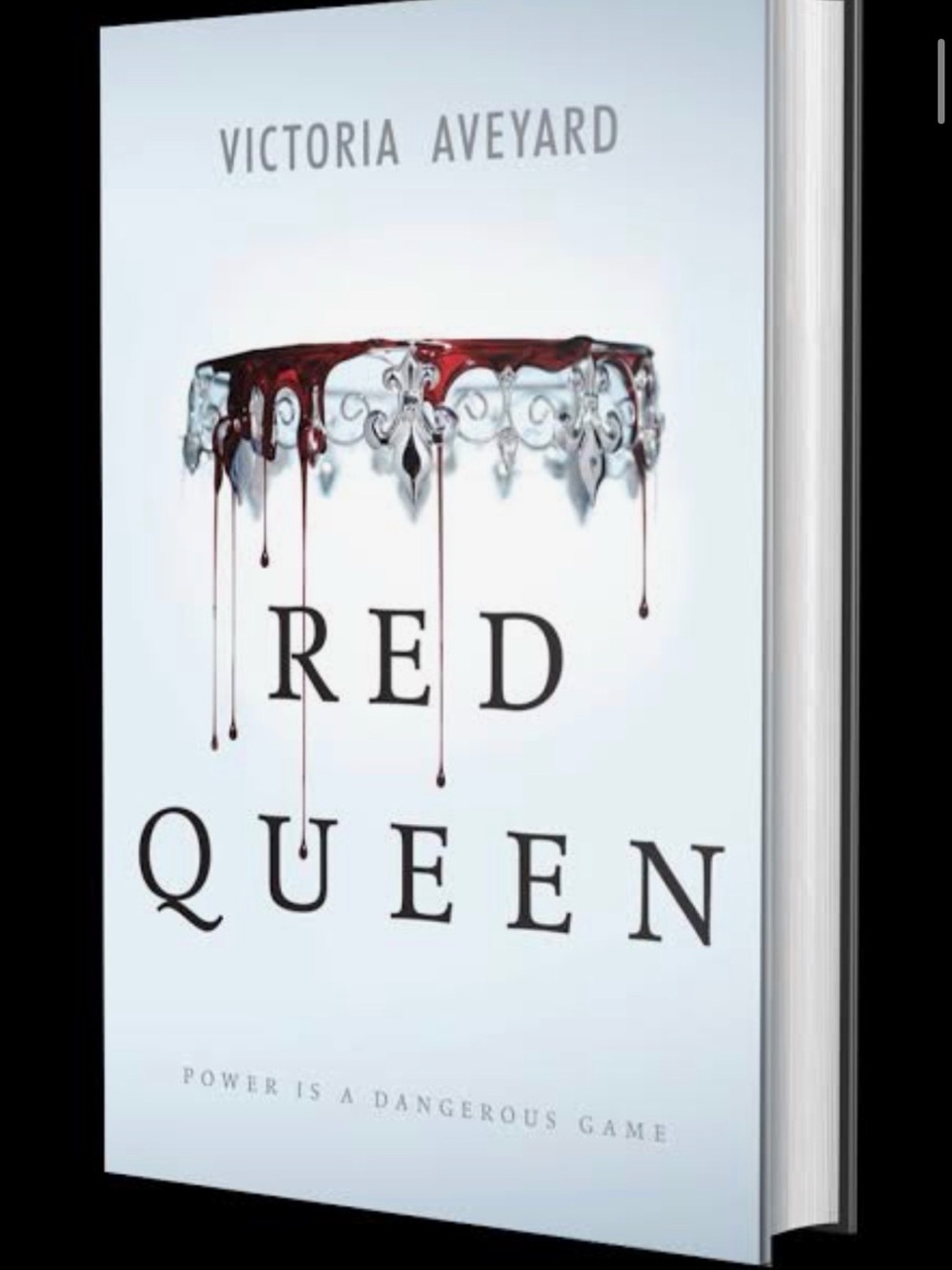 Novel - Red Queen by Victoria Aveyard - Book with White Cover with Red Accents